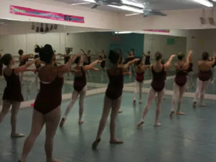 dancers in leotard and tights